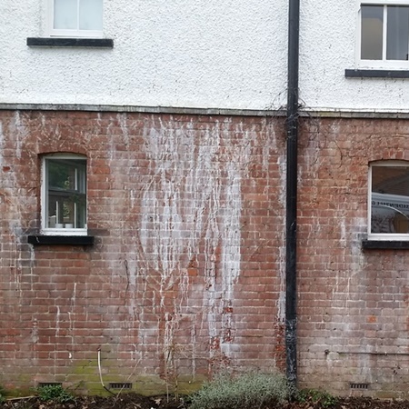 Brickwork covered in paint