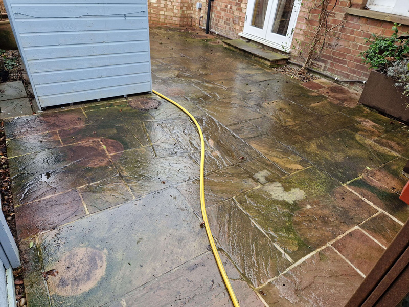 Herts pressure washing before patio