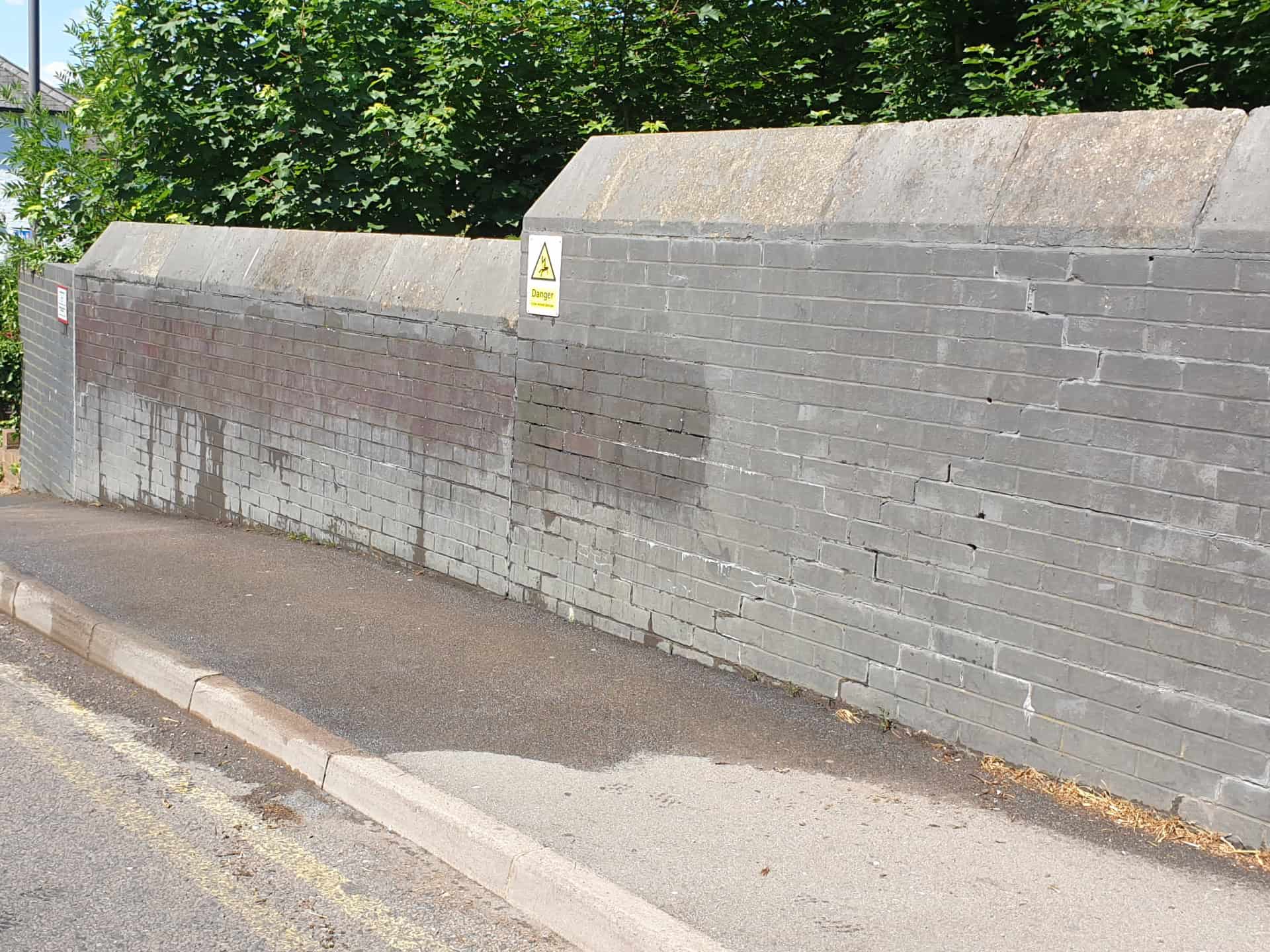 Cleaned up wall after graffiti removal