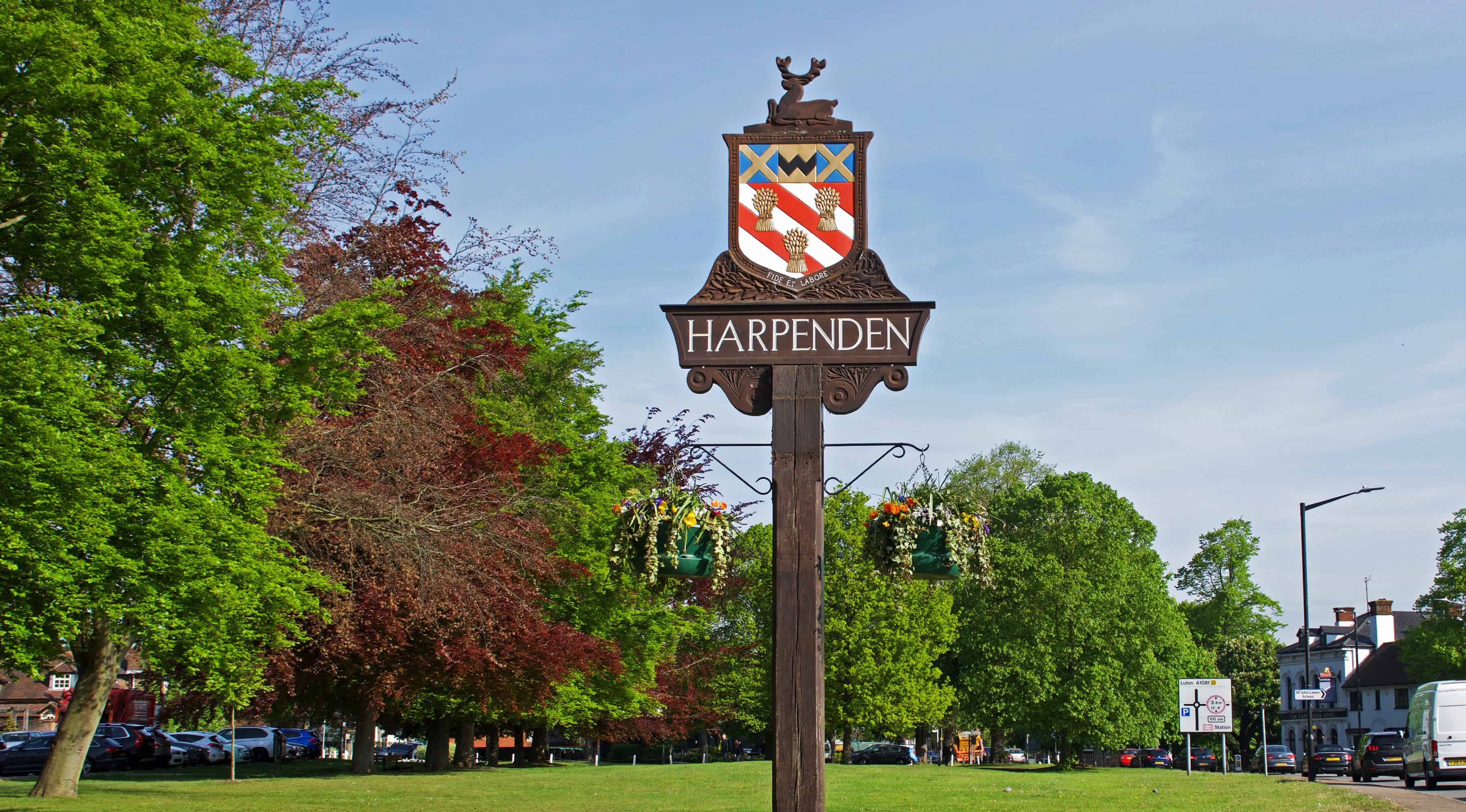 Harpenden village sign on the common in the town centre