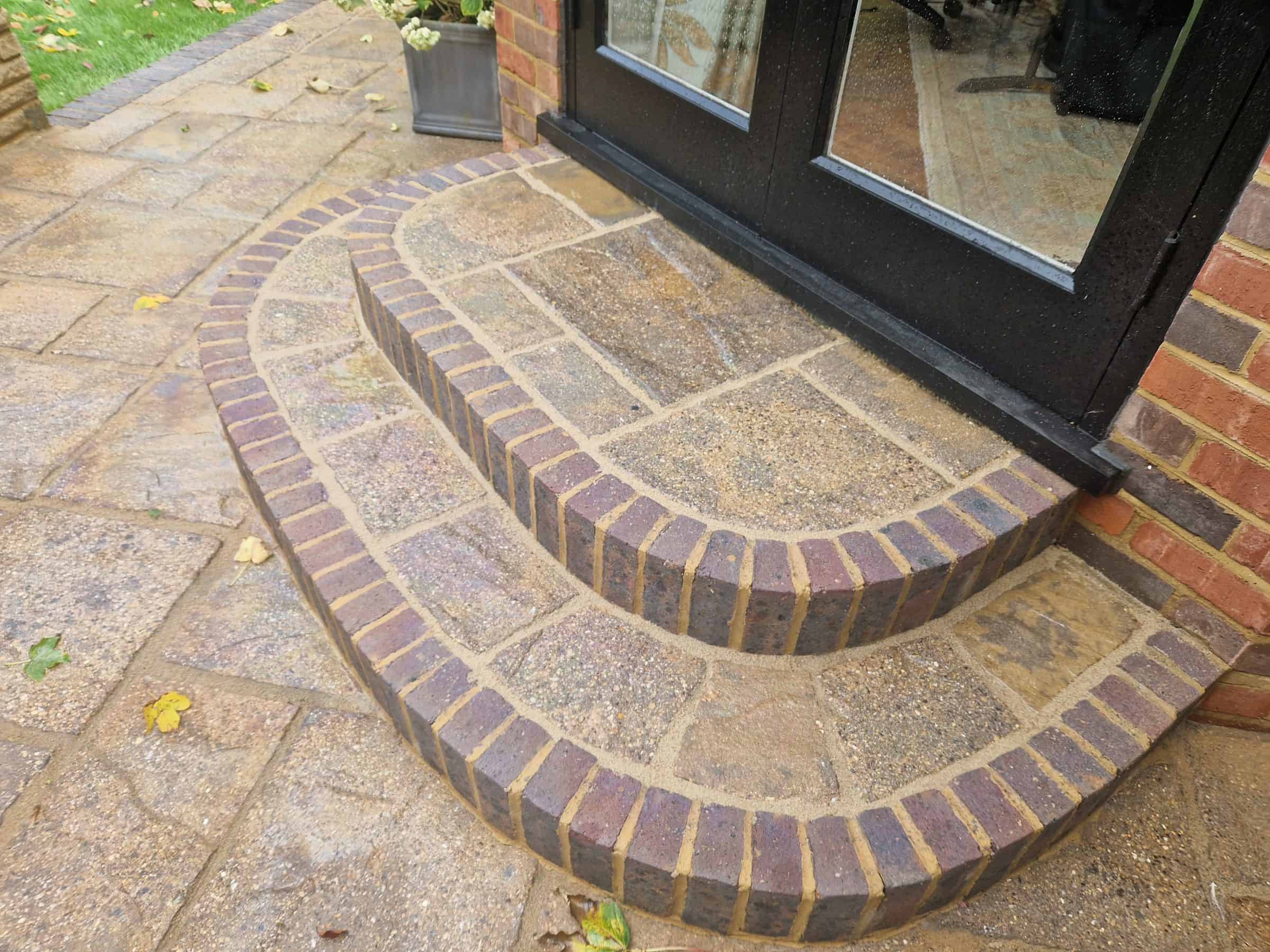 Repointed patio and brick-edged step in Radlett with fresh resin pointing
