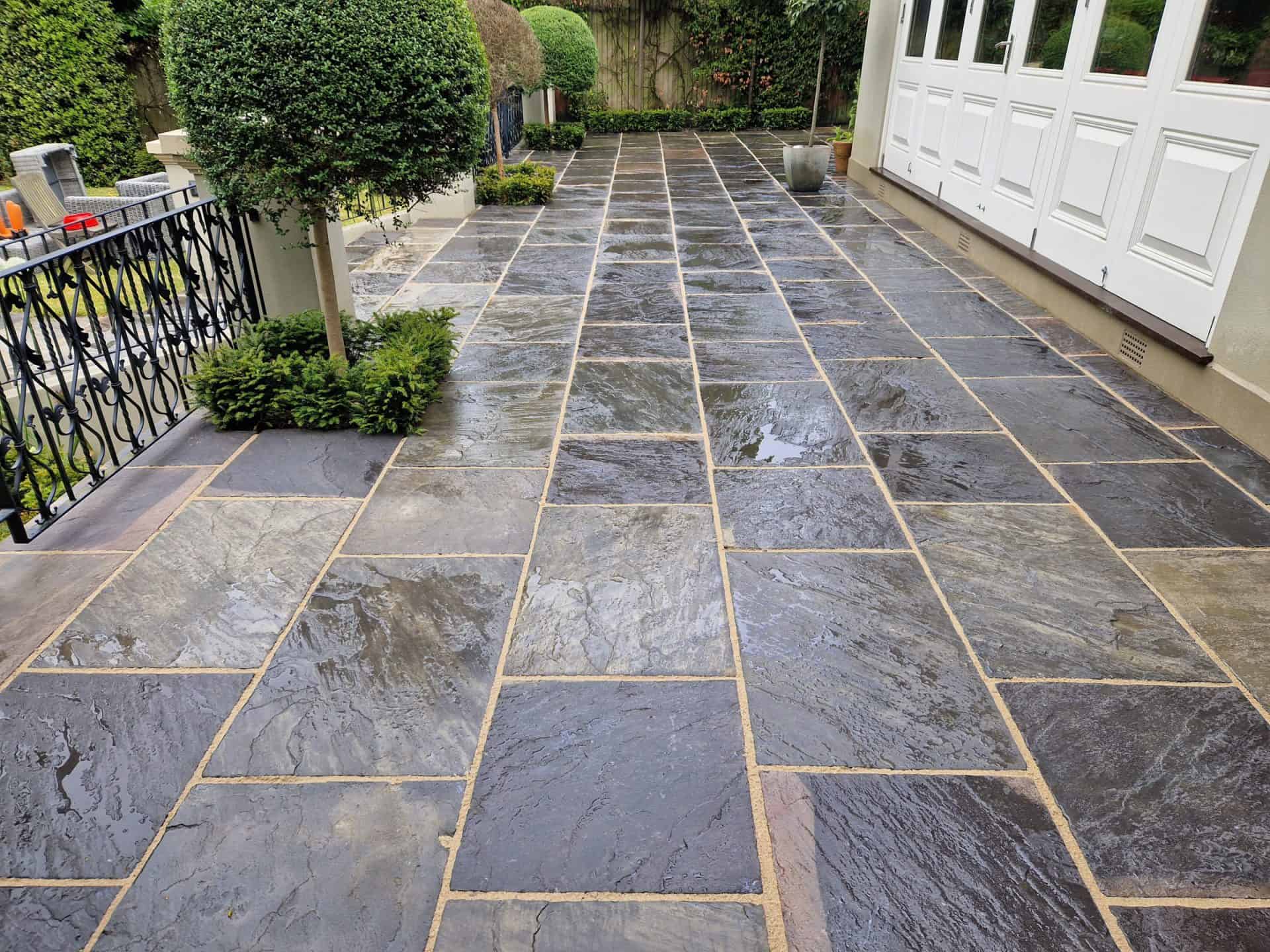 Slate patio in Barnet after cleaning and repointing
